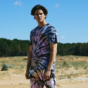 Les Benjamin’s tie dye branded shirt.